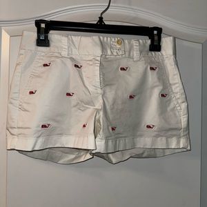 Vineyard vines white shorts with pink whales on them.